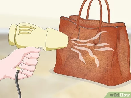 Dùng máy sấy khô