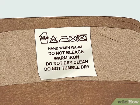 Làm theo hướng dẫn sử dụng có trên tag áo