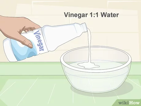 Trộn giấm vào nước